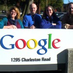 Team Evergreen standing behind the Google sign